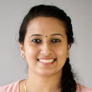 Circular avatar containing an image of Karthika Vijayan
